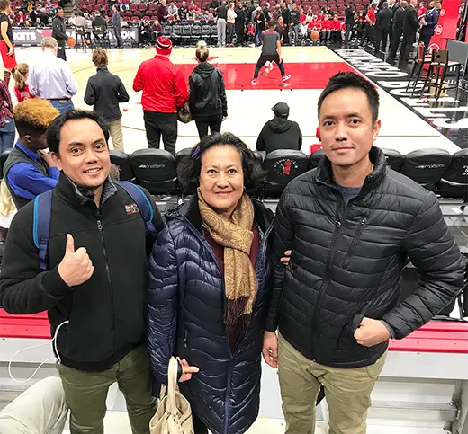 a photo of me with my brother and aunt at united center