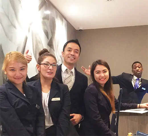 a photo with the hilton receptionists